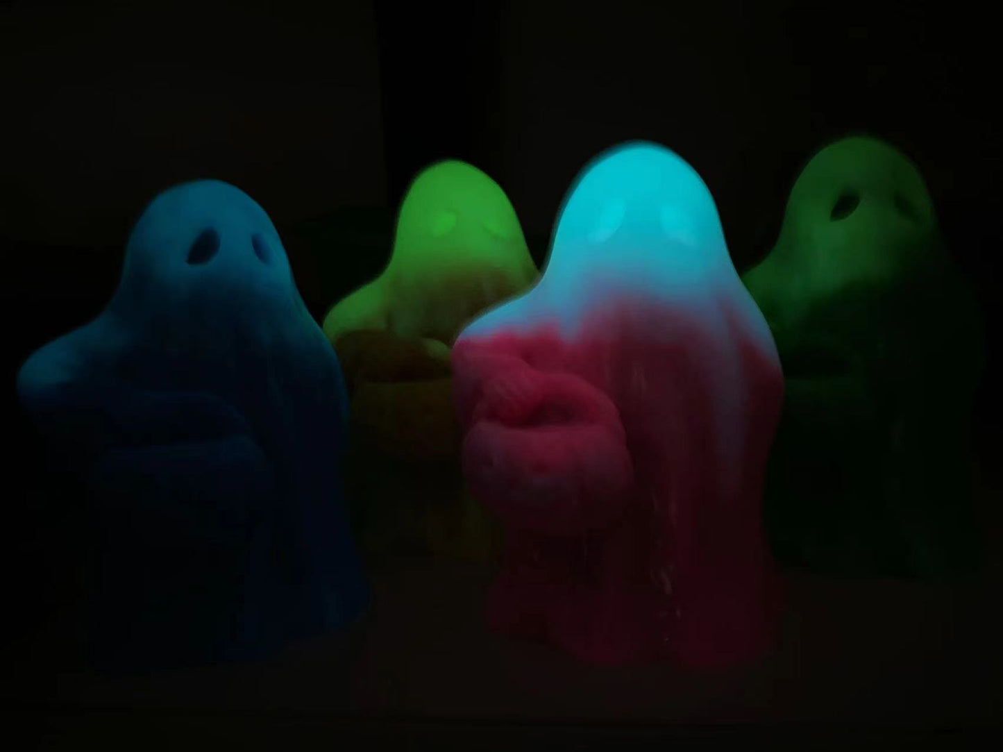 Luminous ghost with pumpkin carving