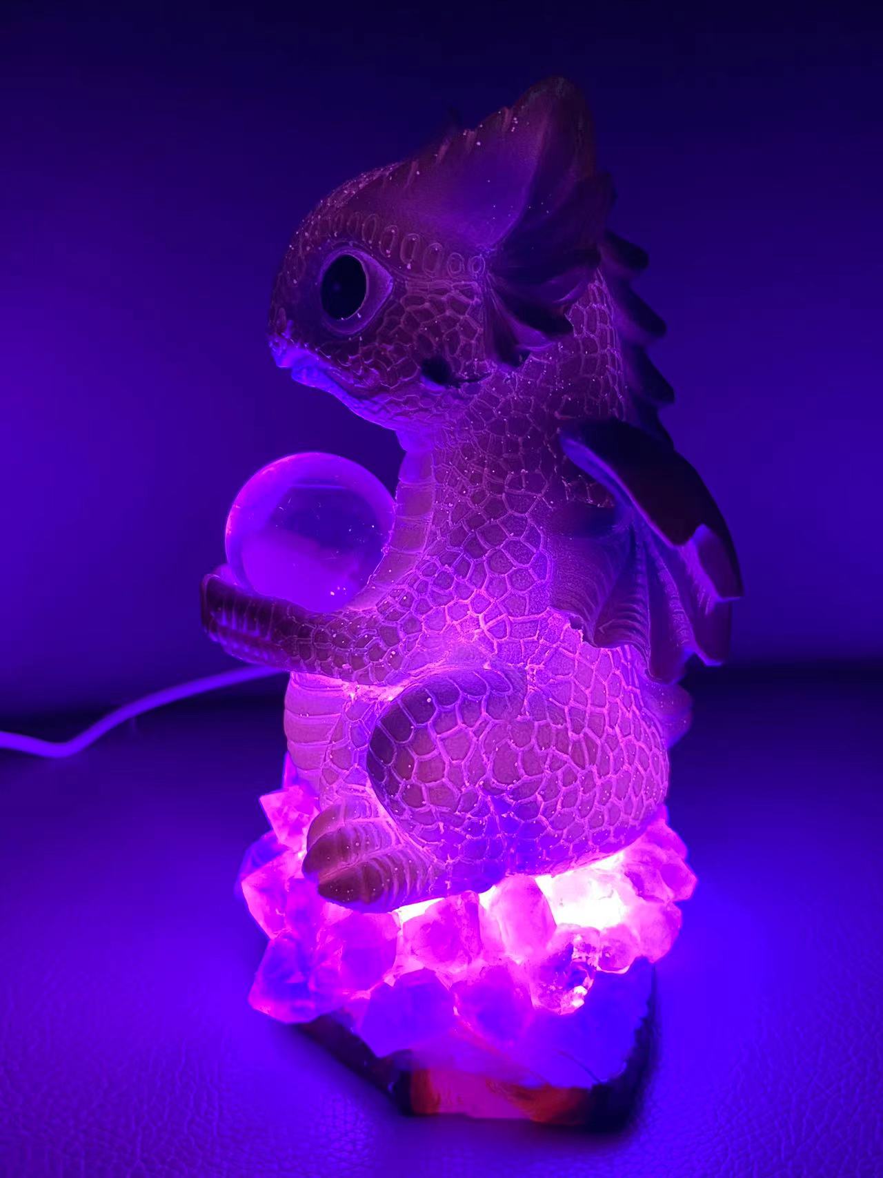 Flying dragon hold sphere light