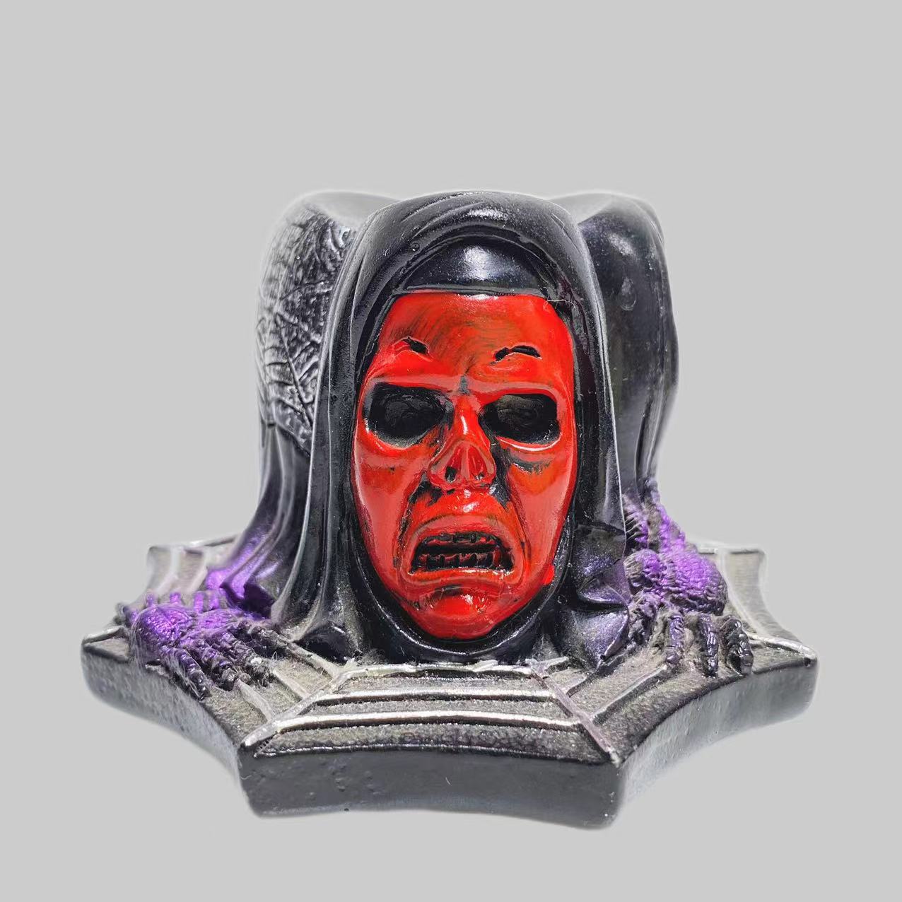 three masks sphere stand