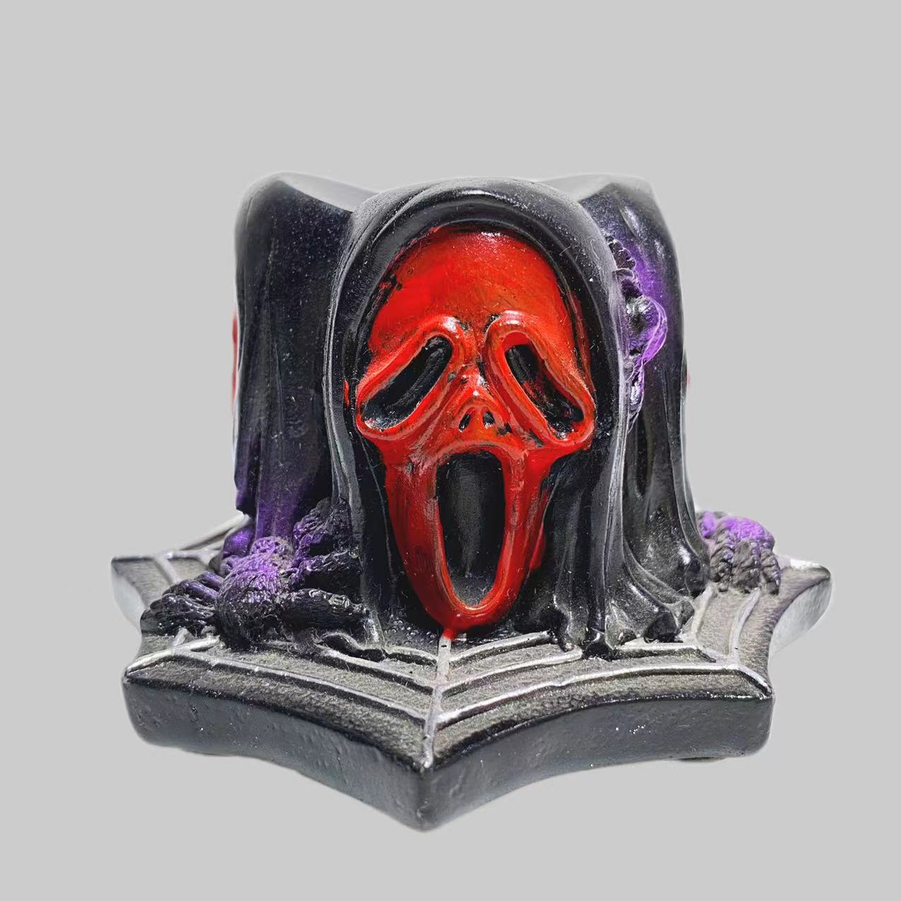 three masks sphere stand