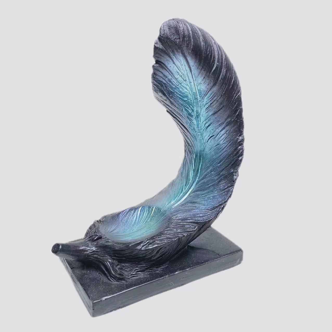 Resin feather sphere stand