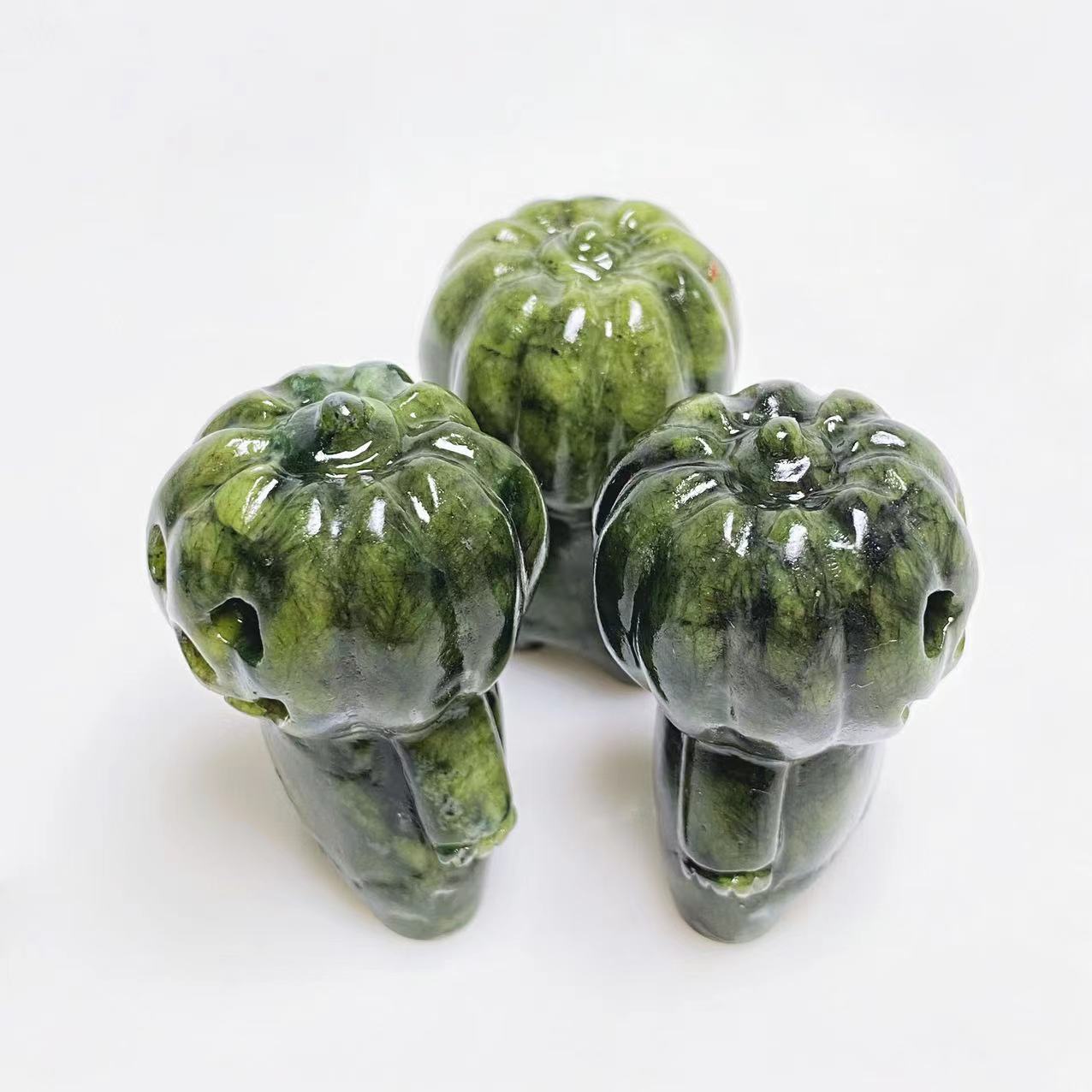 Green jade pumpkin man carving