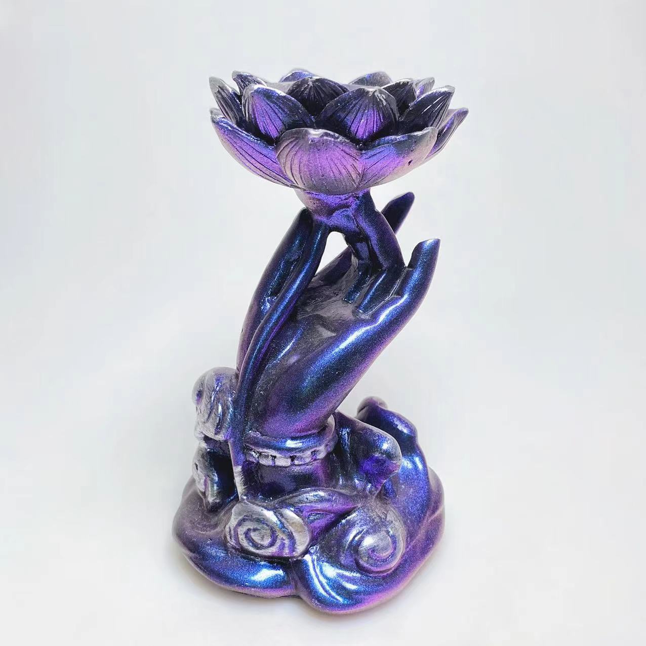 Resin hand with lotus sphere stand