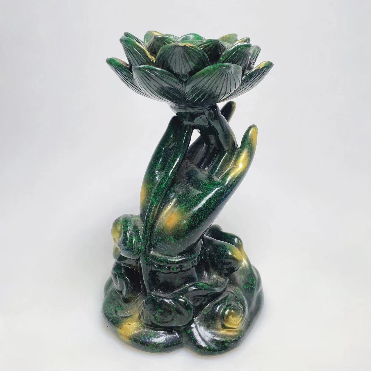 Resin hand with lotus sphere stand