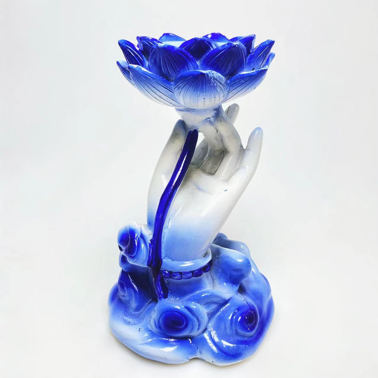 Resin hand with lotus sphere stand