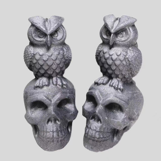 Shungite owl on skull
