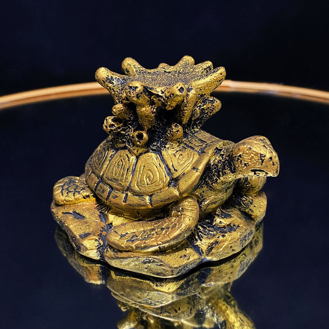 Resin turtle with coral sphere stand