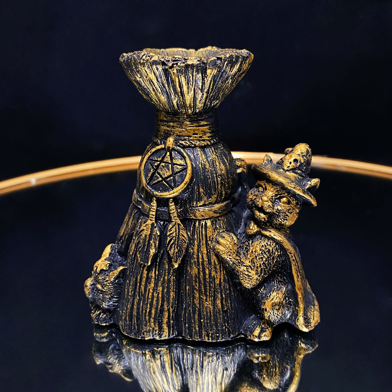 Resin broom with magic cat sphere stand