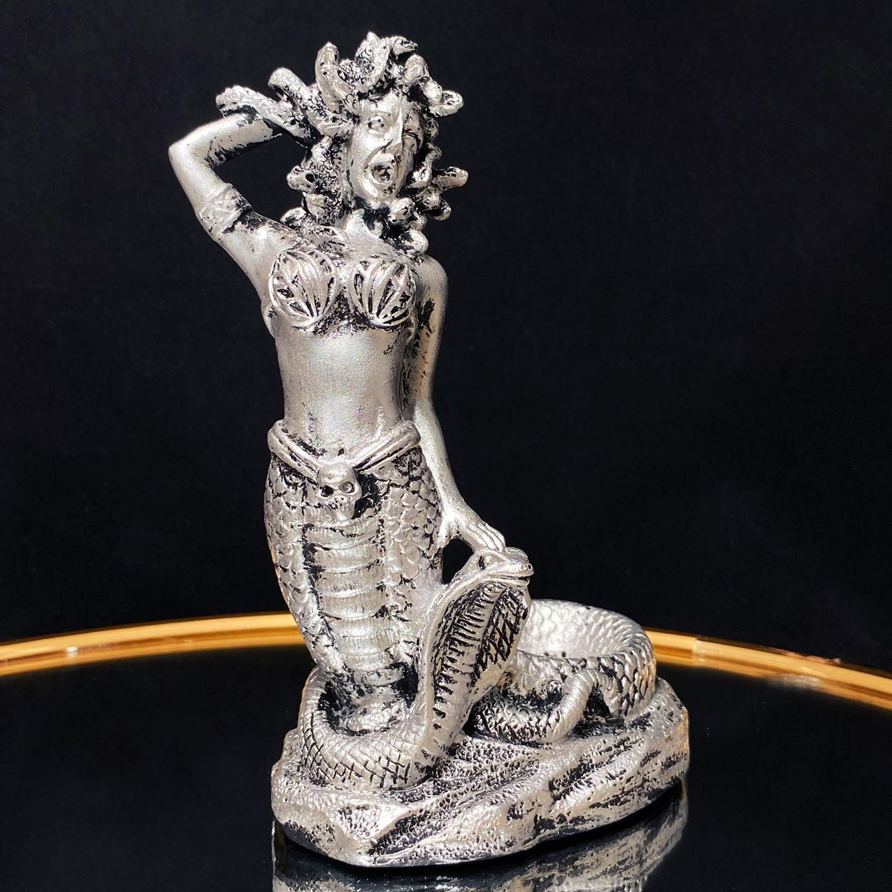 Resin medusa sphere stand