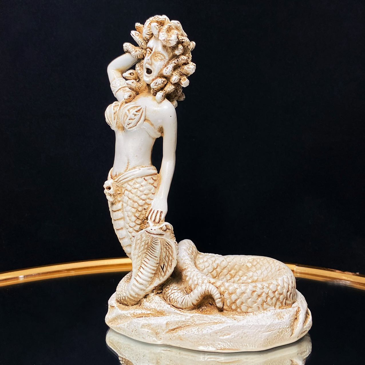 Resin medusa sphere stand