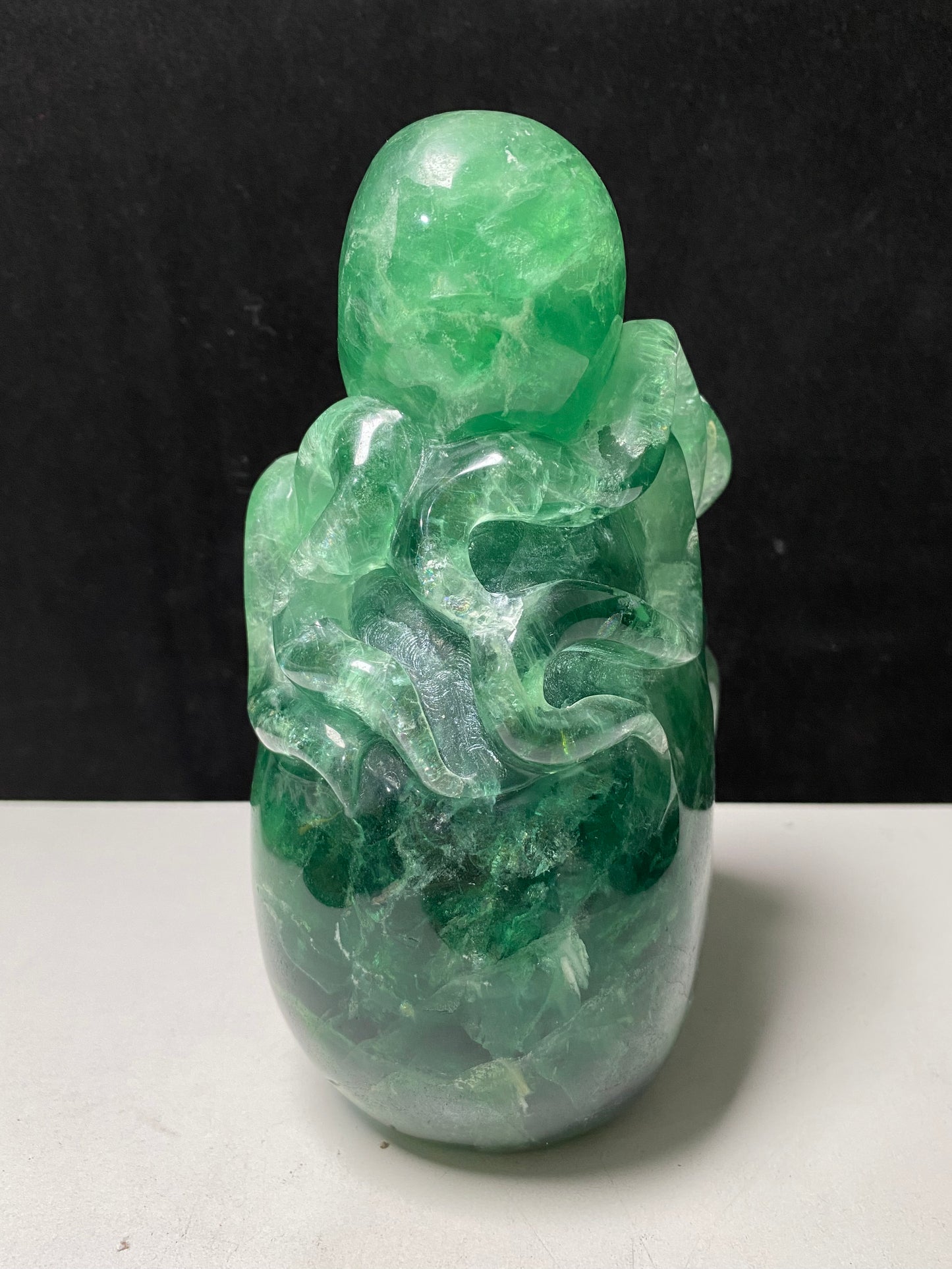 Green fluorite octopus on skull carving#2594