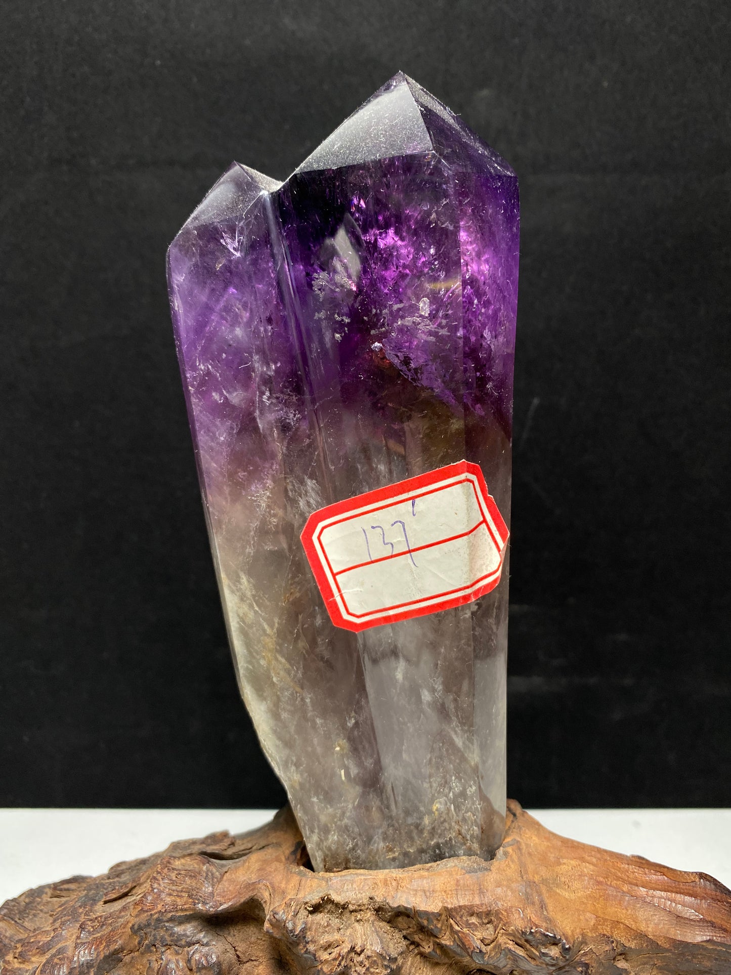 Amethyst double wand on wooden stand