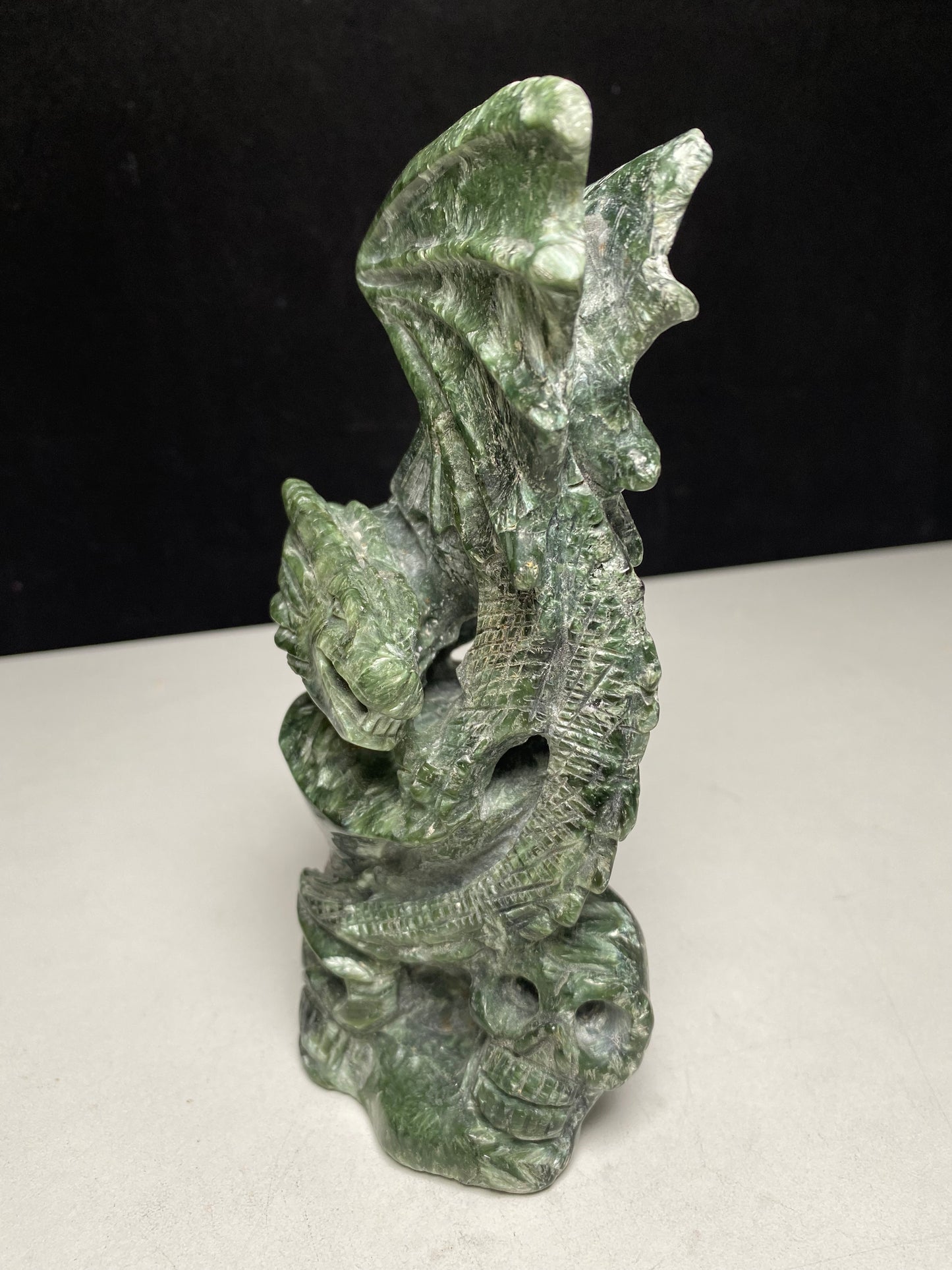 Seraphinite flying dragon on double skulls #0551