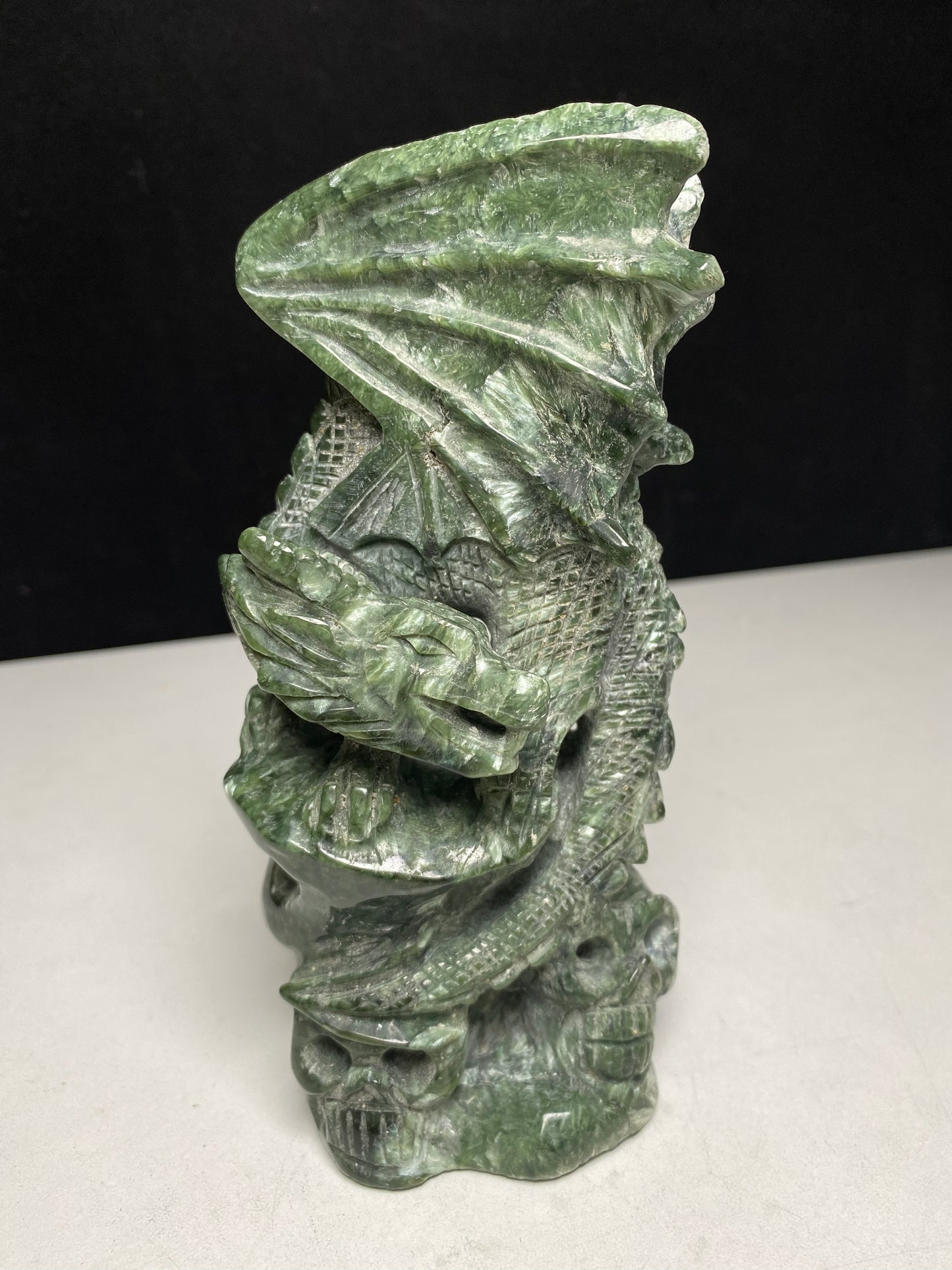 Seraphinite flying dragon on double skulls #0551