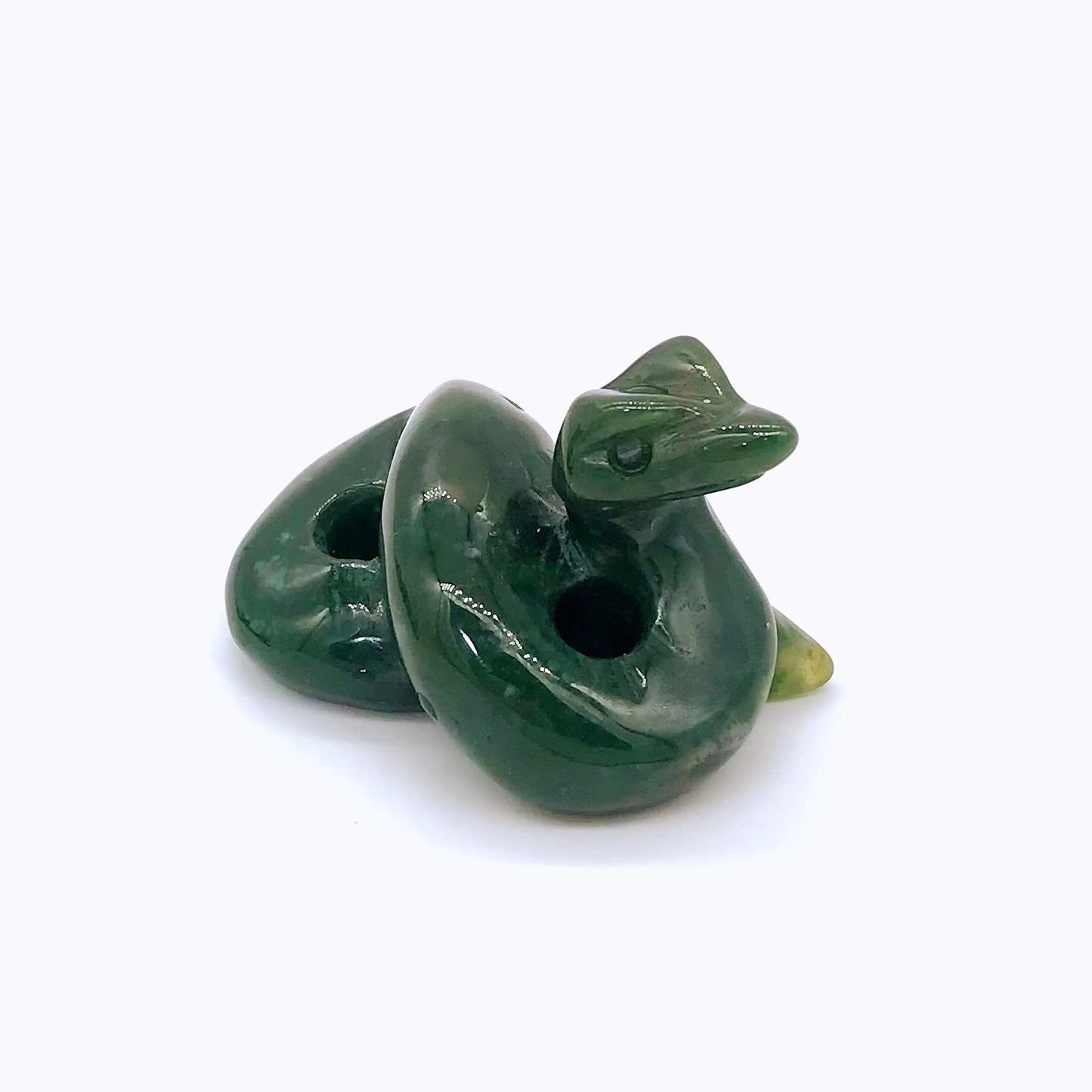 Crystal snake carvings of different materials