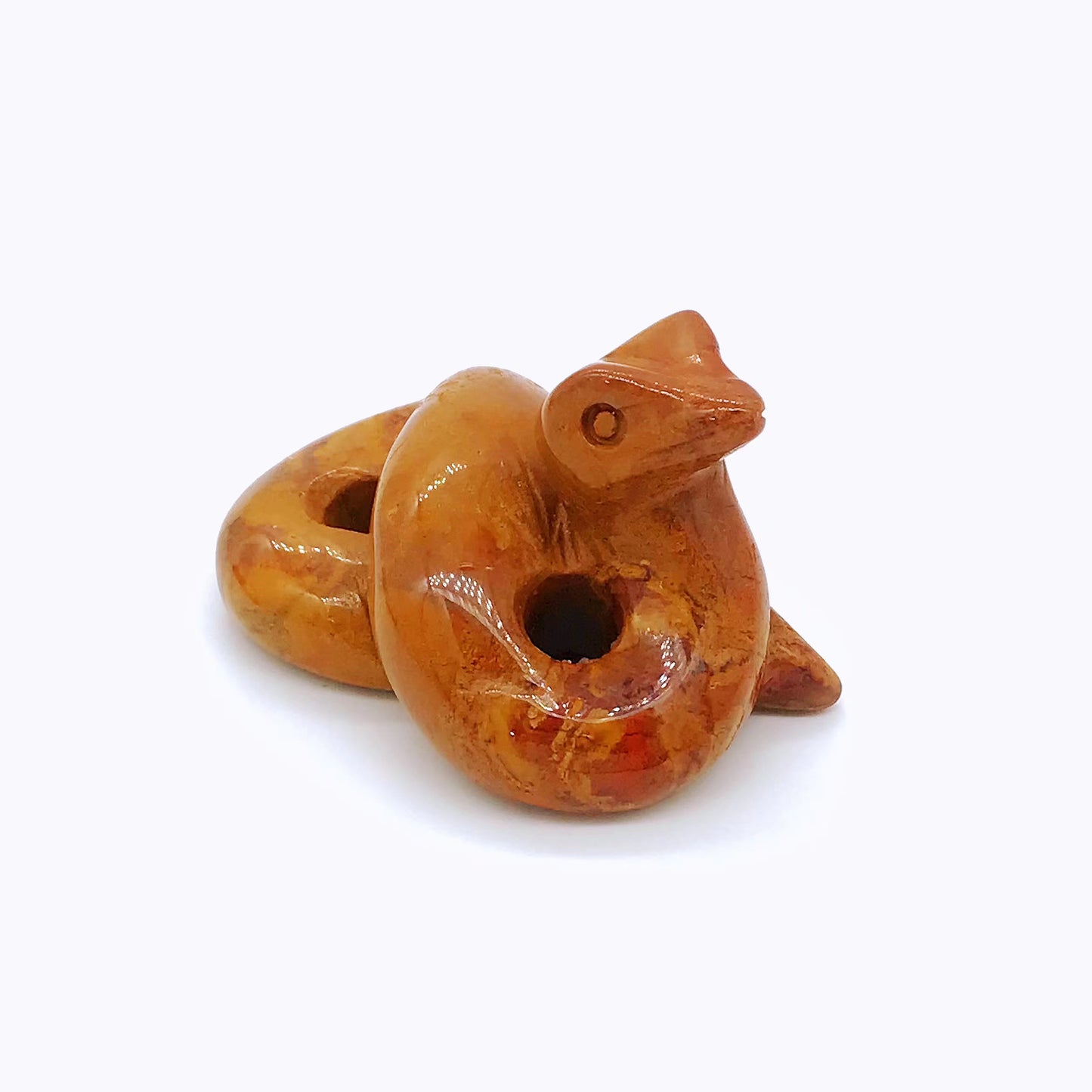 Crystal snake carvings of different materials