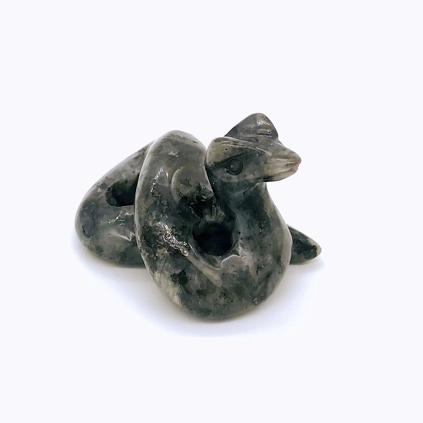 Crystal snake carvings of different materials