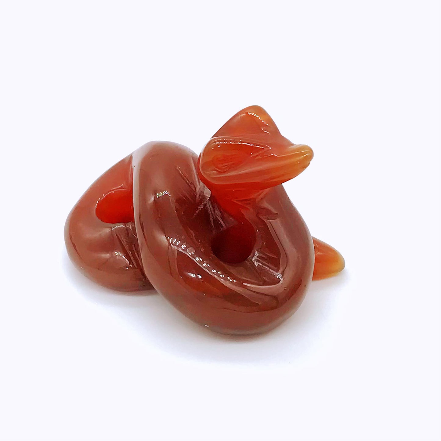 Crystal snake carvings of different materials