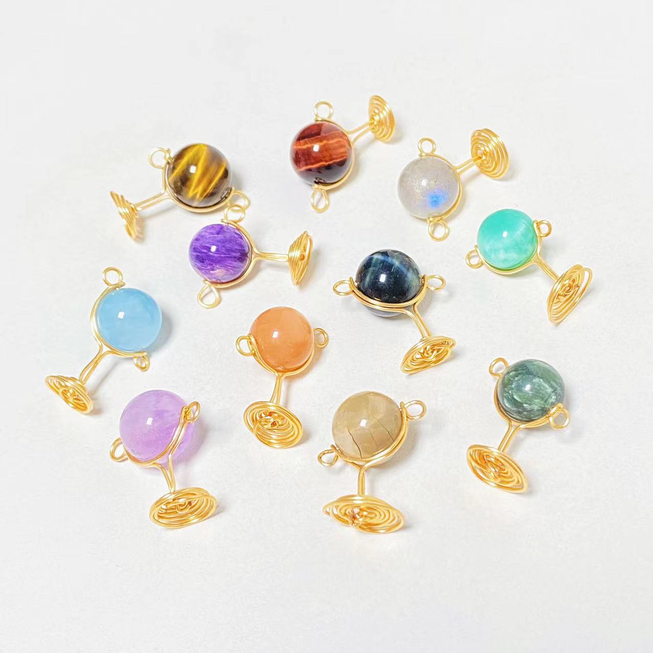 Different materials planet pendants