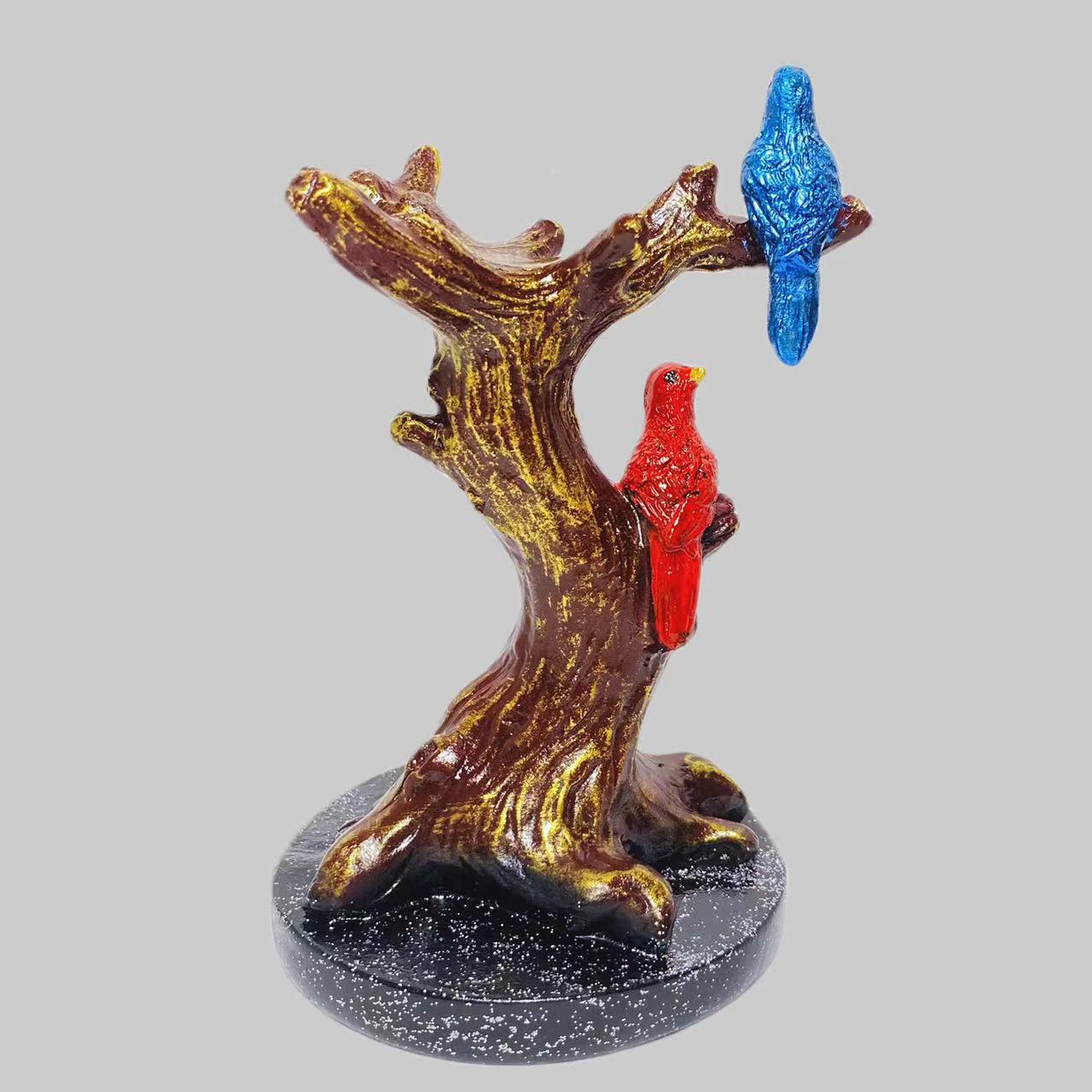 Resin birds on tee sphere stand