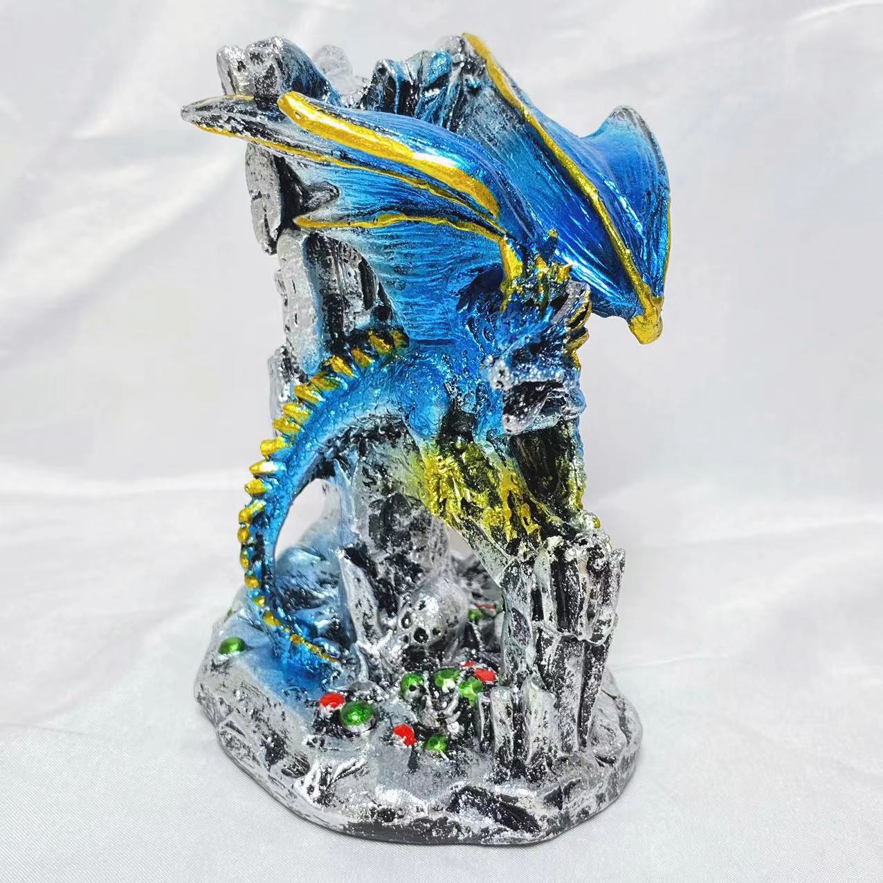 Resin flying dragon on castle sphere stand