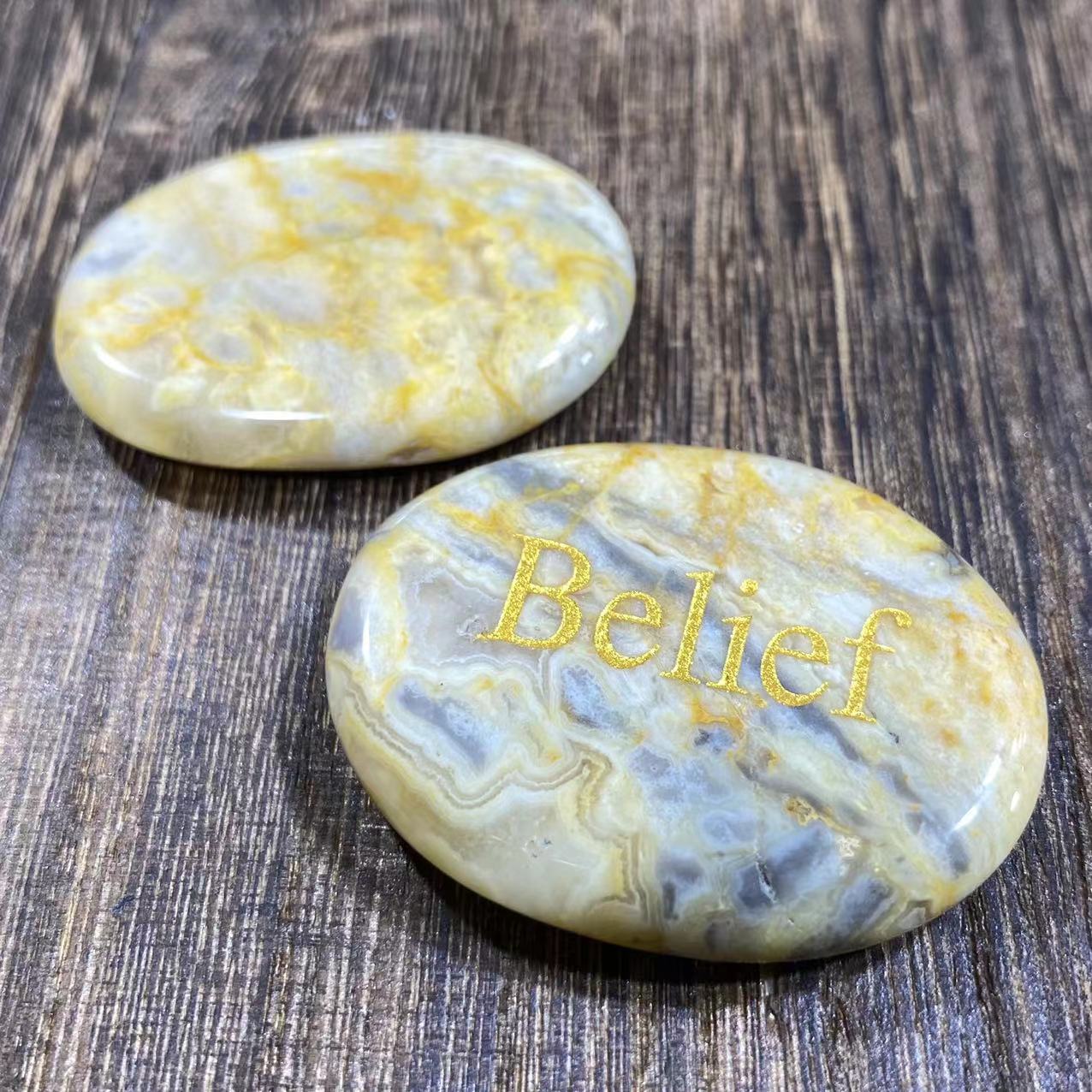 Different materials word oval slab