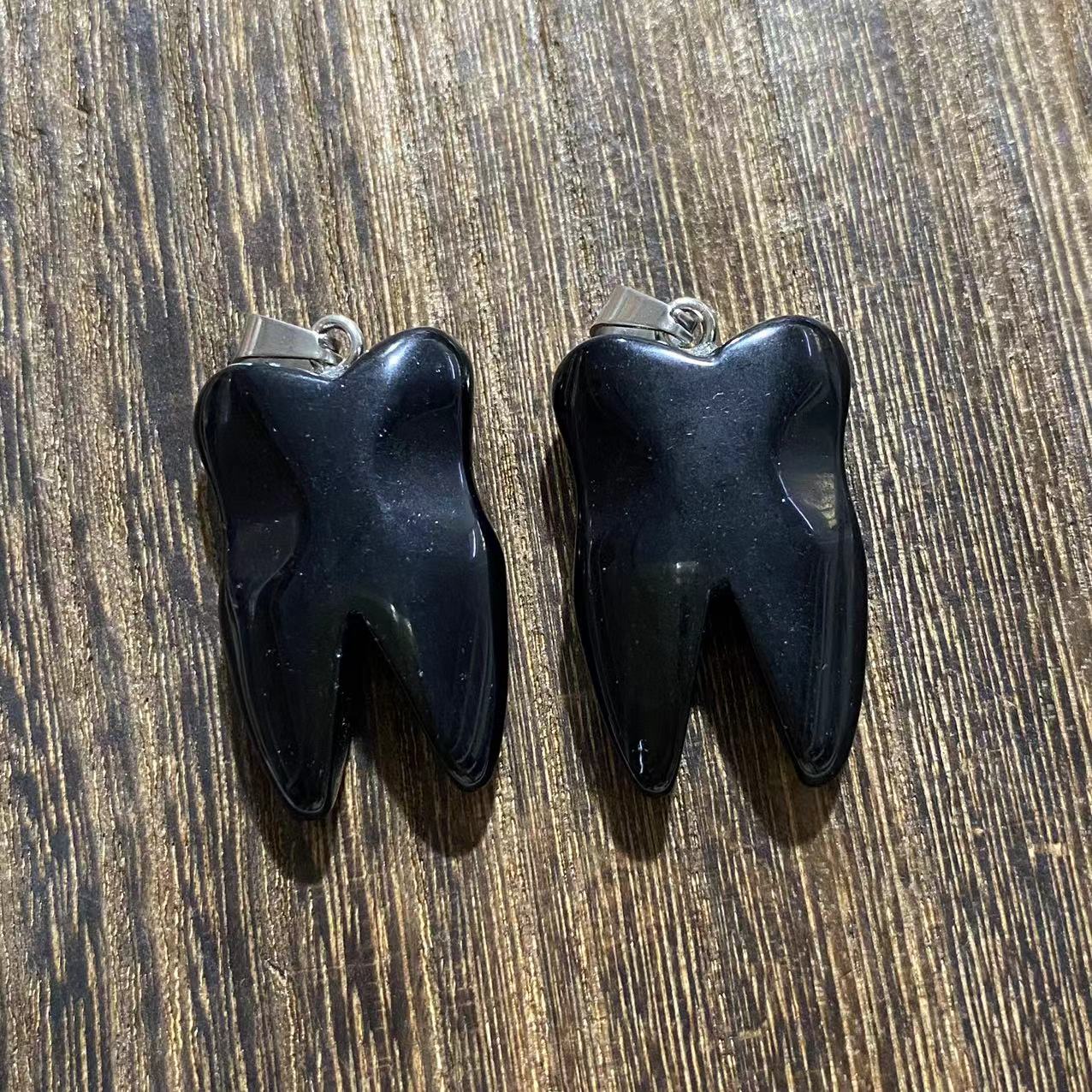 Tooth pendants