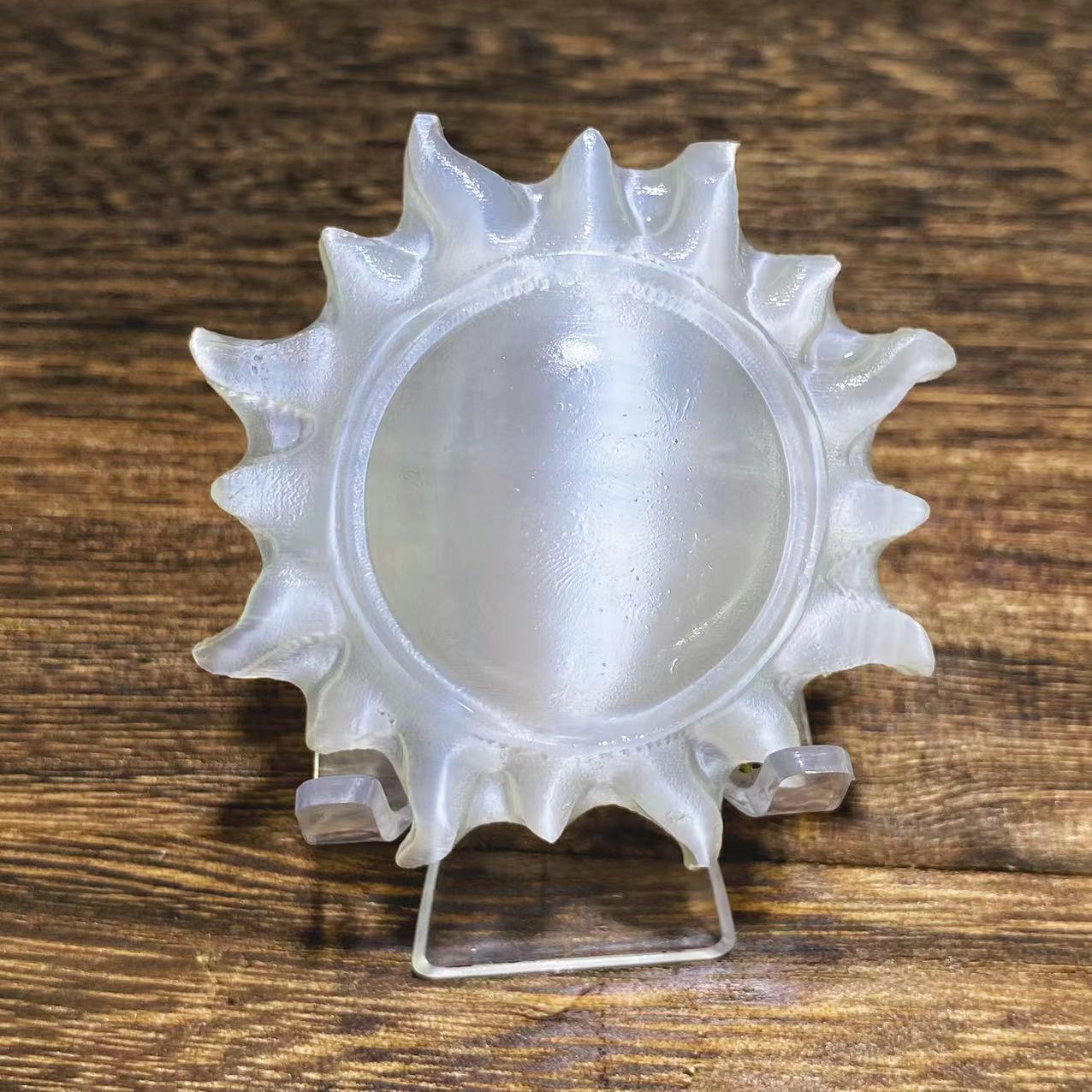 Selenite sun carving
