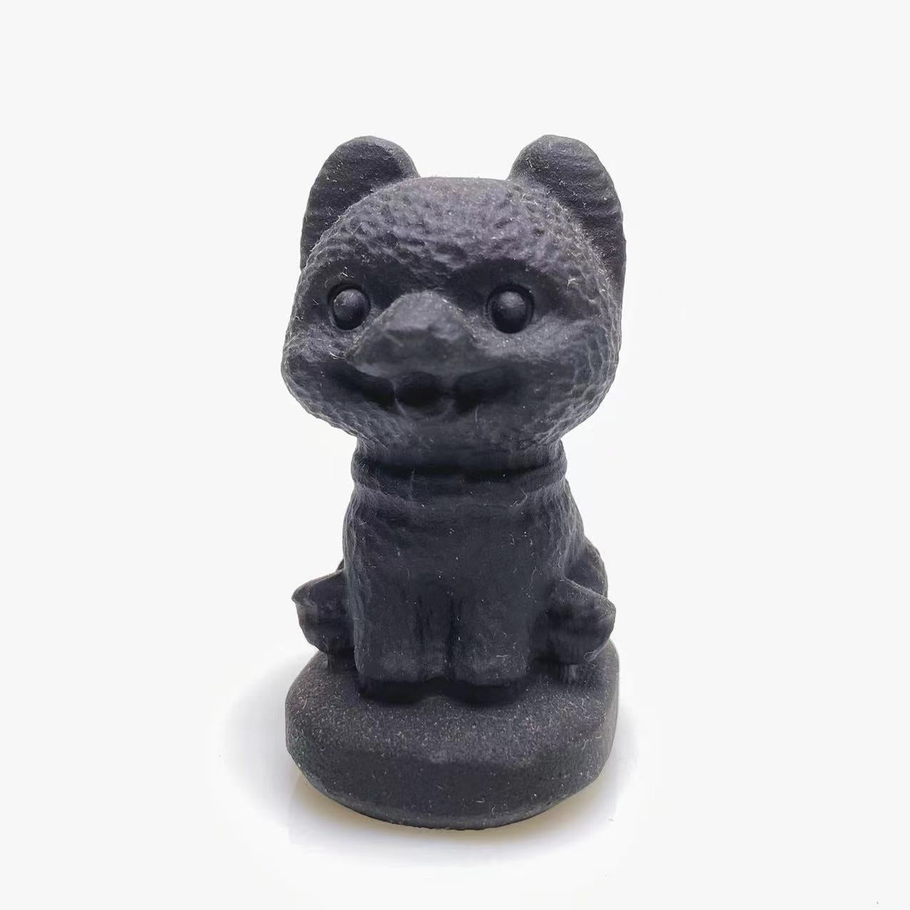 Black obsidian happy dog carving