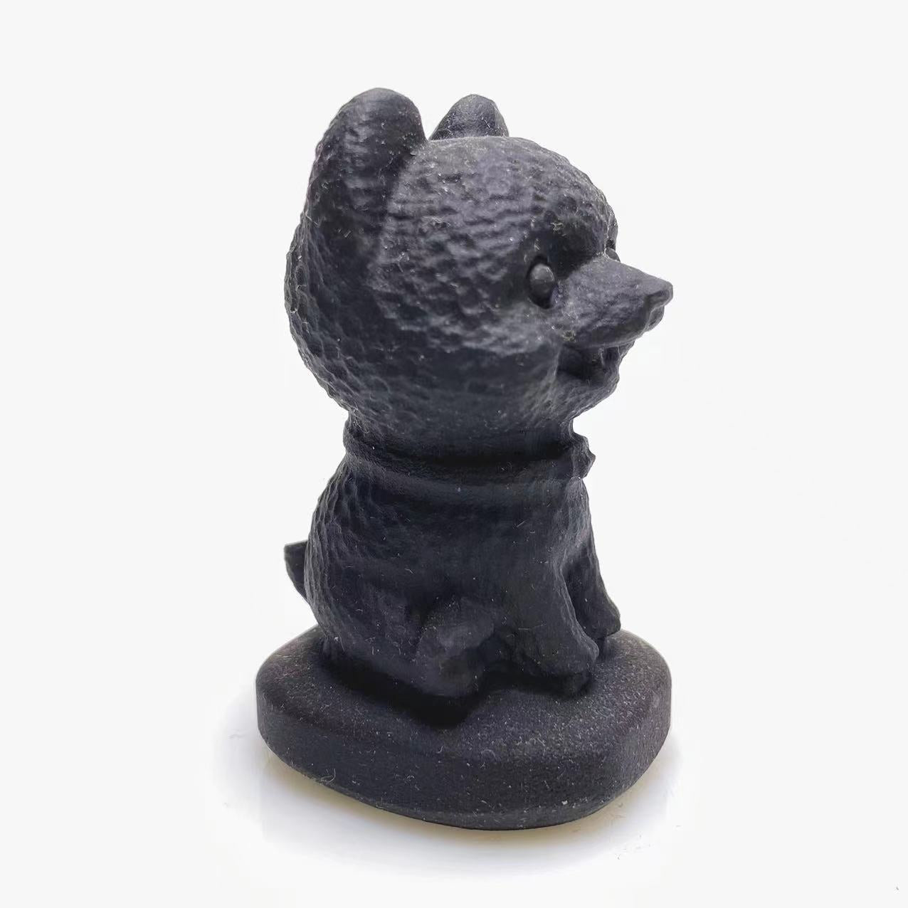 Black obsidian happy dog carving