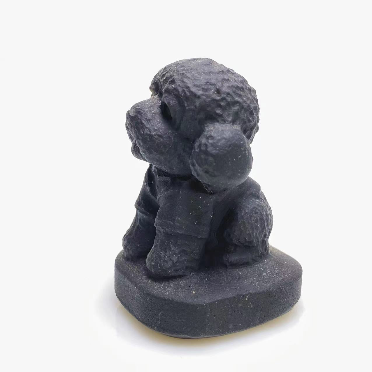 Black obsidian Teddy dog carving