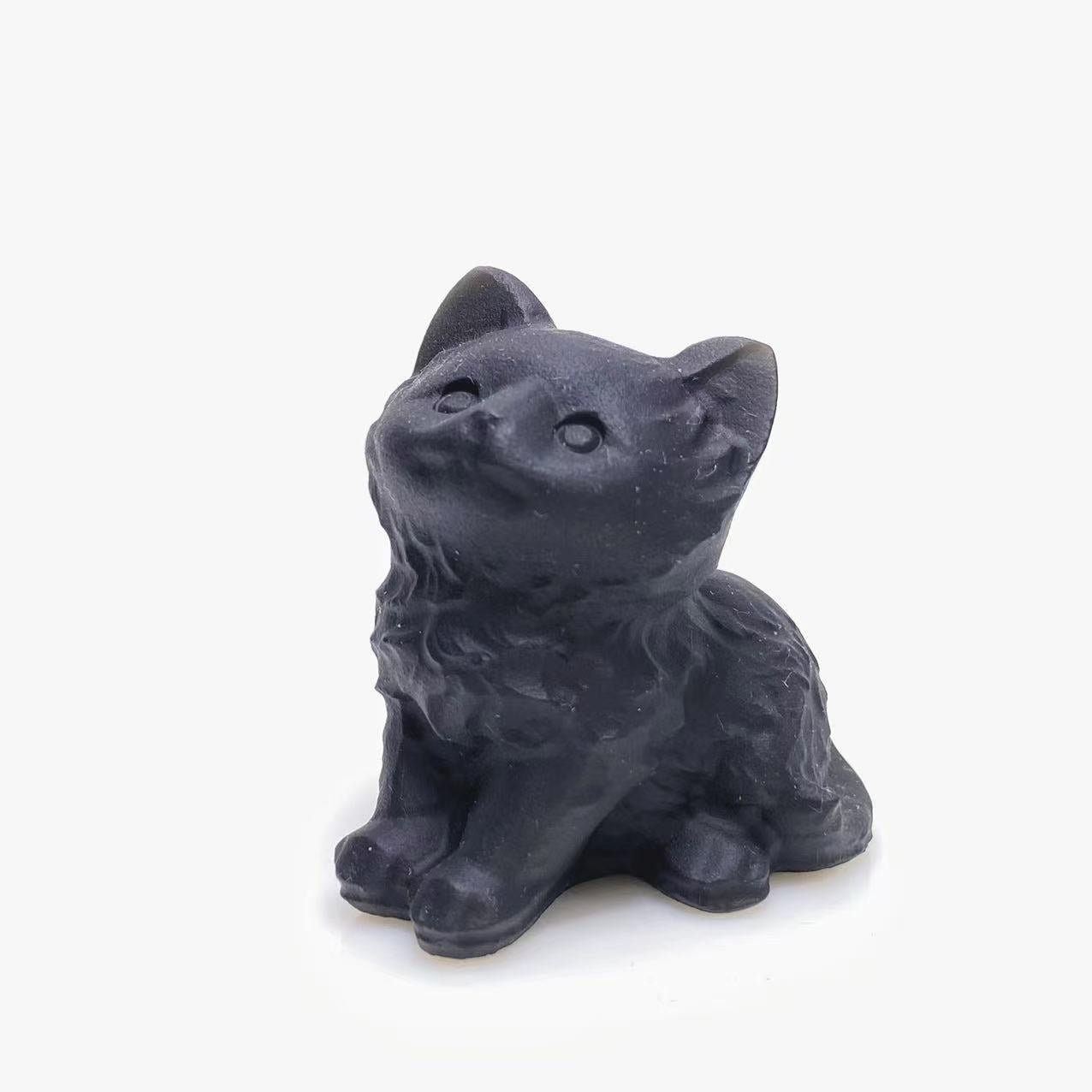 Black obsidian cat carving