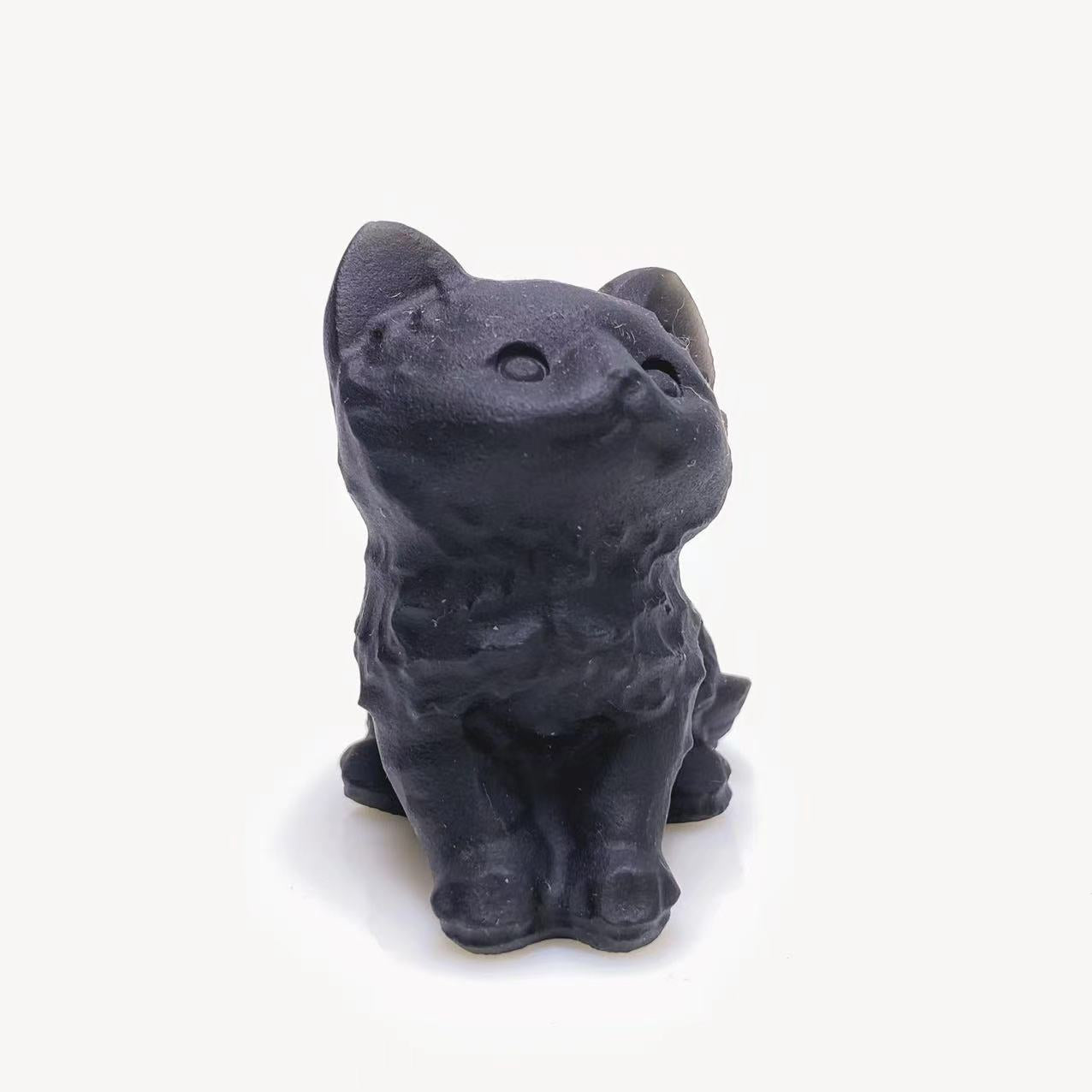 Black obsidian cat carving