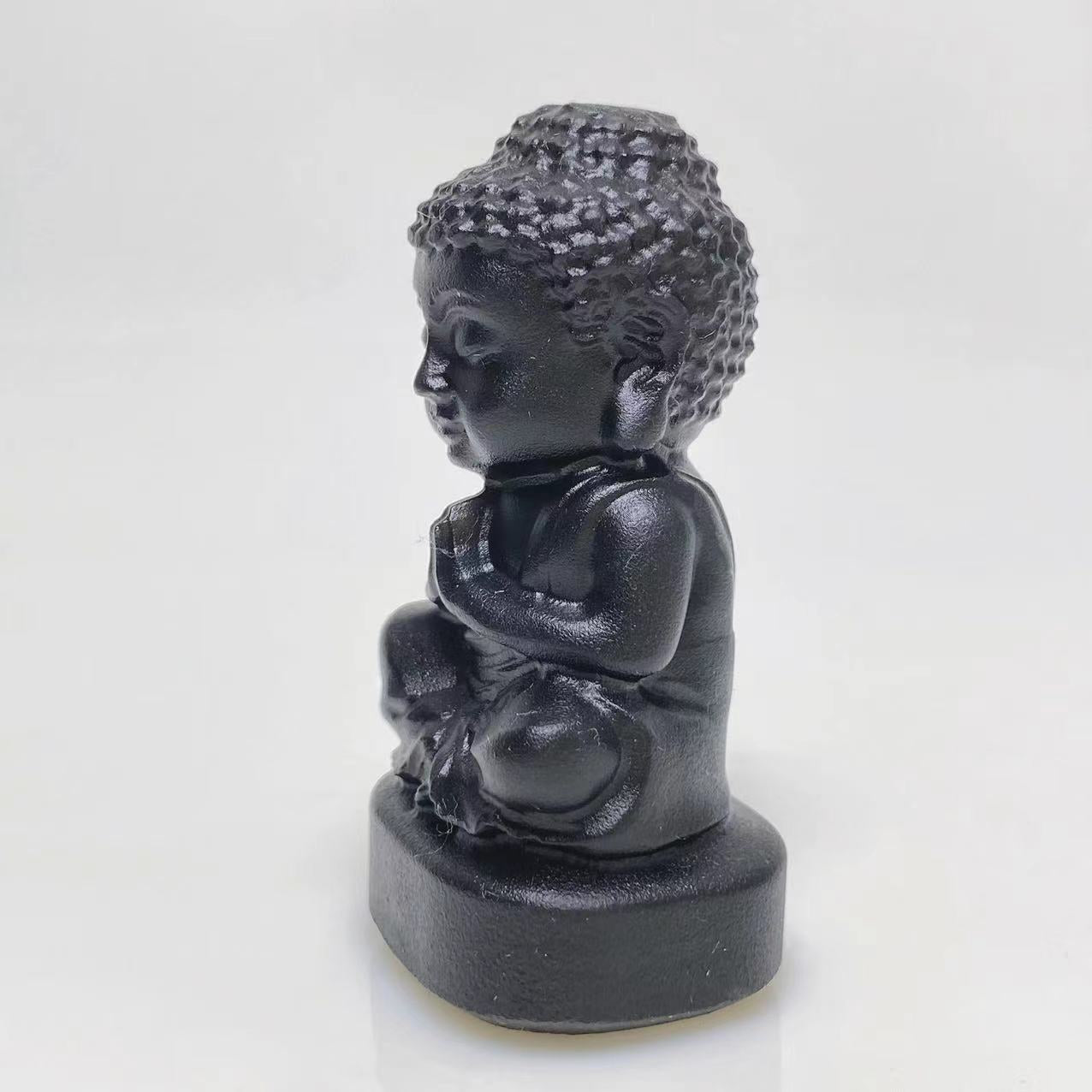 Black obsidian buddha sittig on lotus carving
