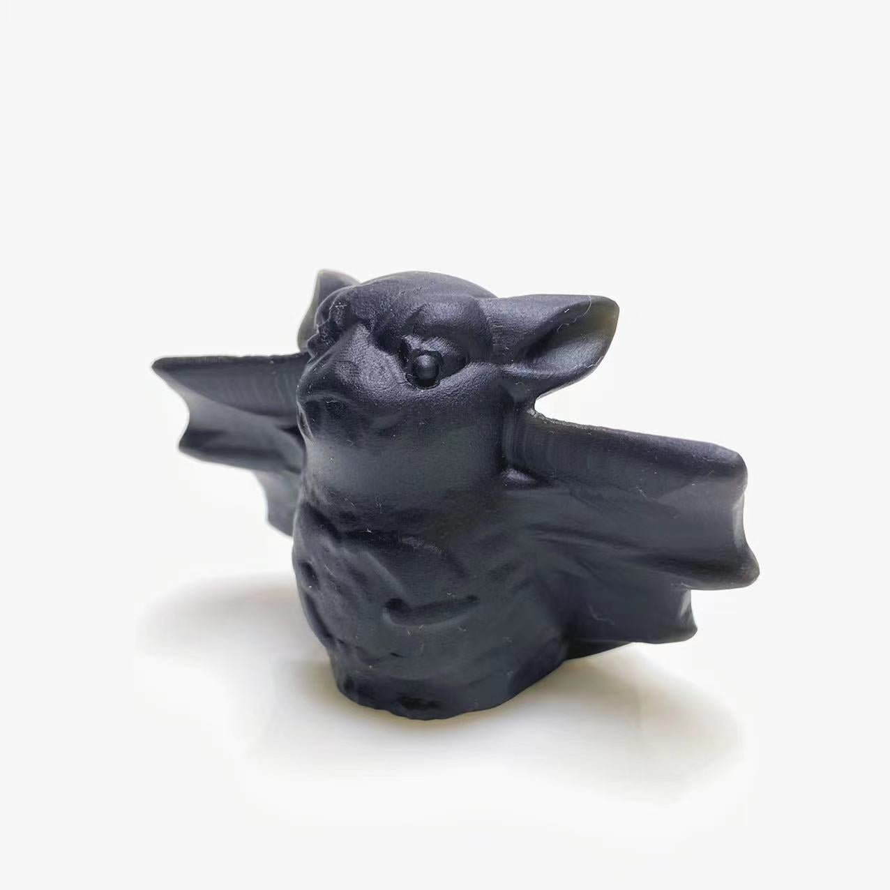 Black obsidian bat carving 2