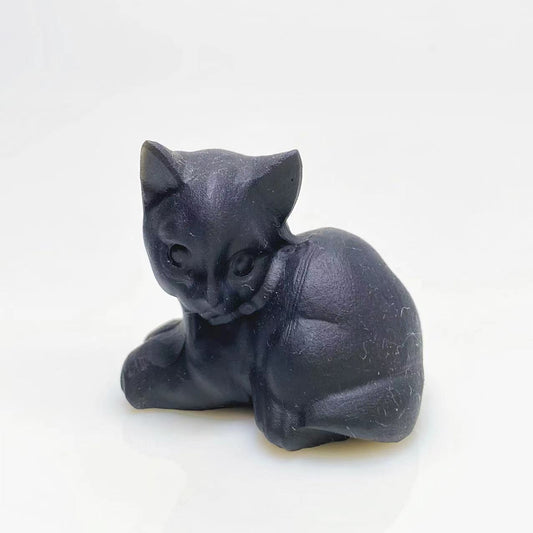 Black obsidian cat carving