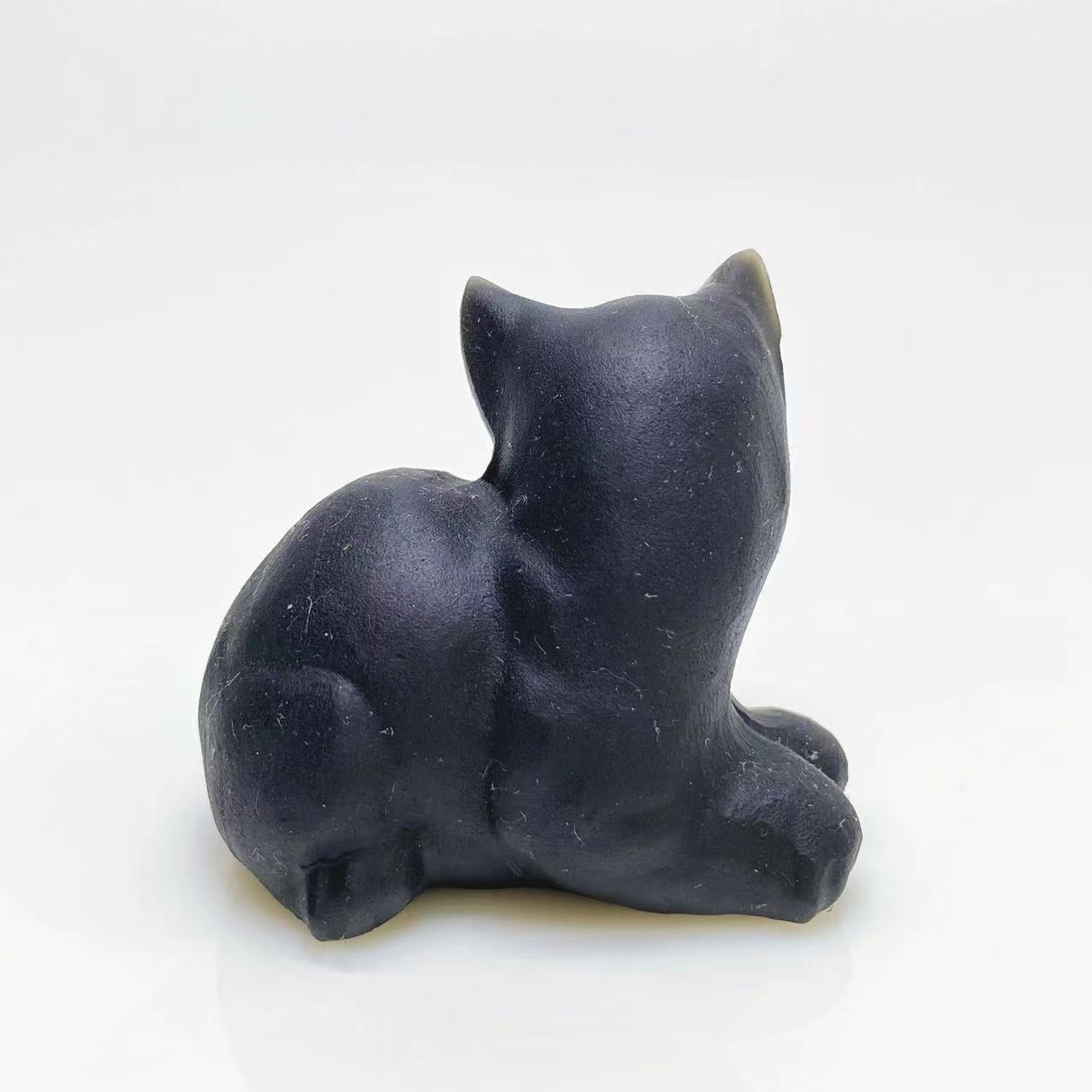 Black obsidian cat carving