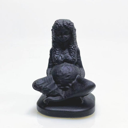 Black obsidian mother earth carving