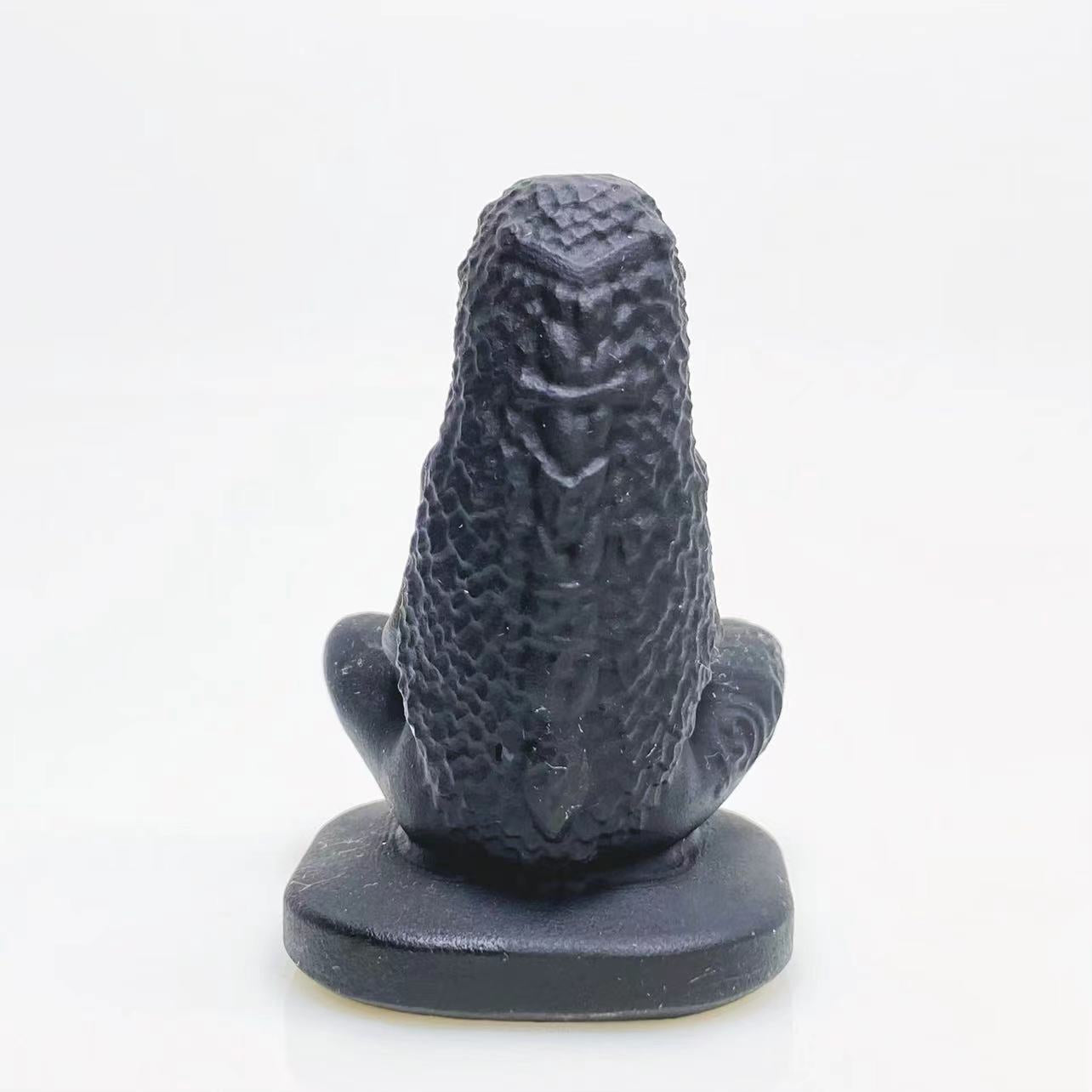 Black obsidian mother earth carving