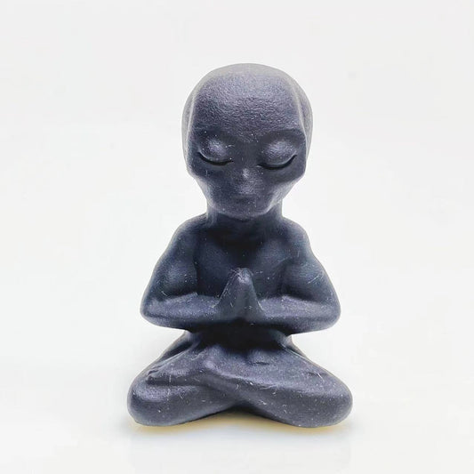 Black obsidian yoga alien carving