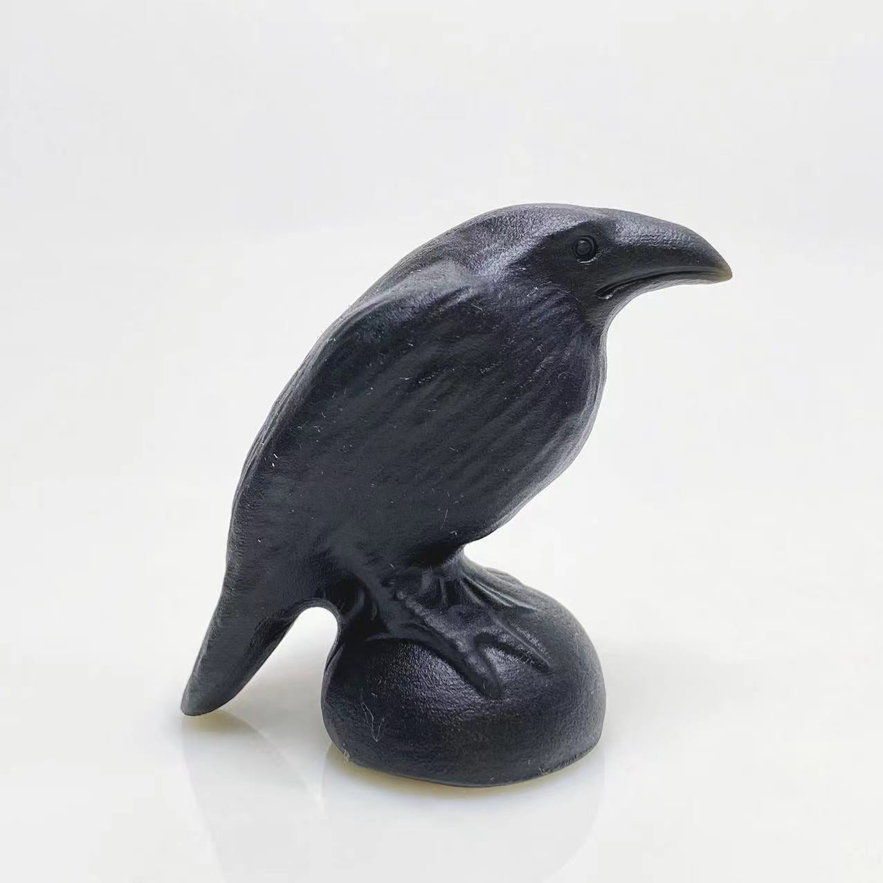Black obsidian raven carving