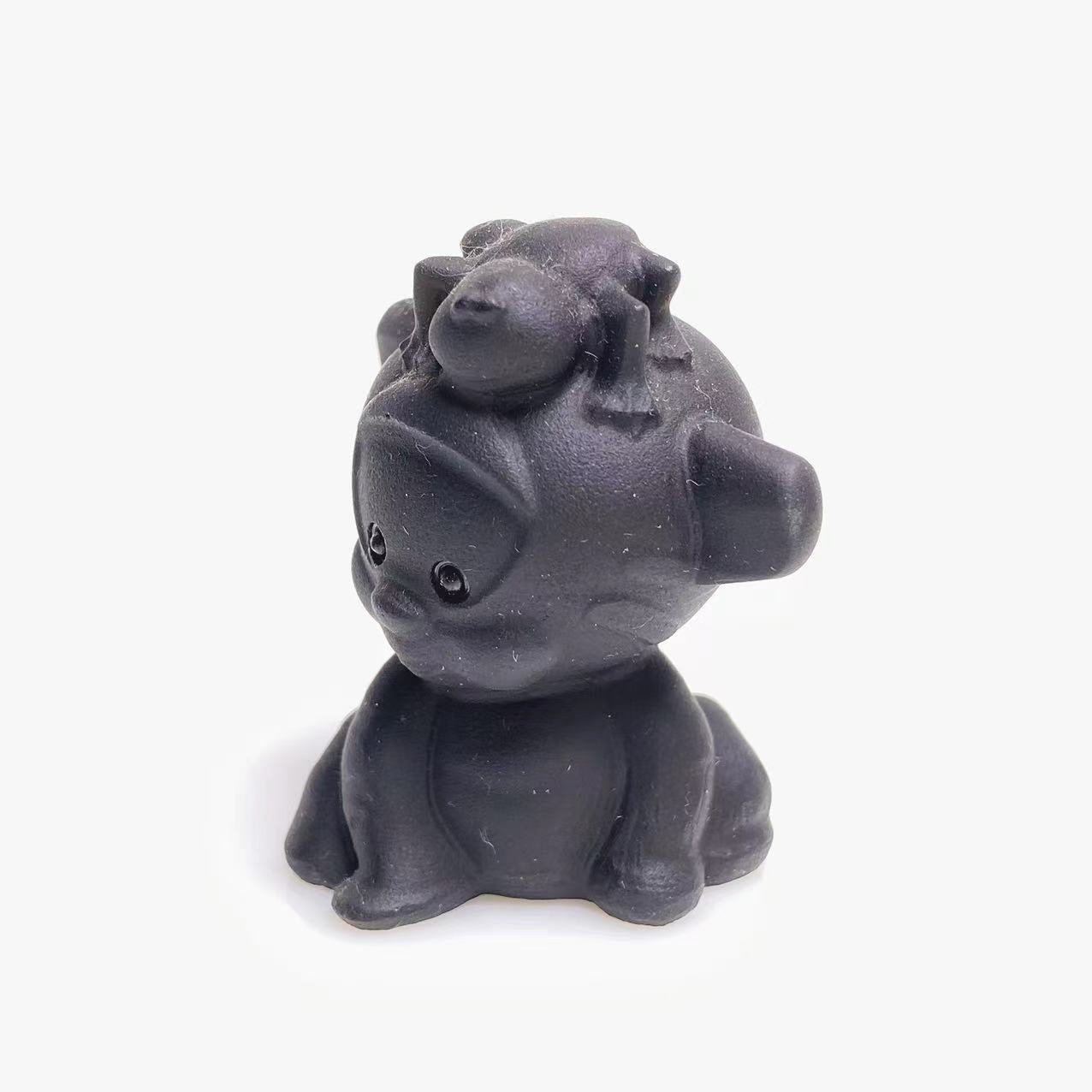 Black obsidian monkey frog carving