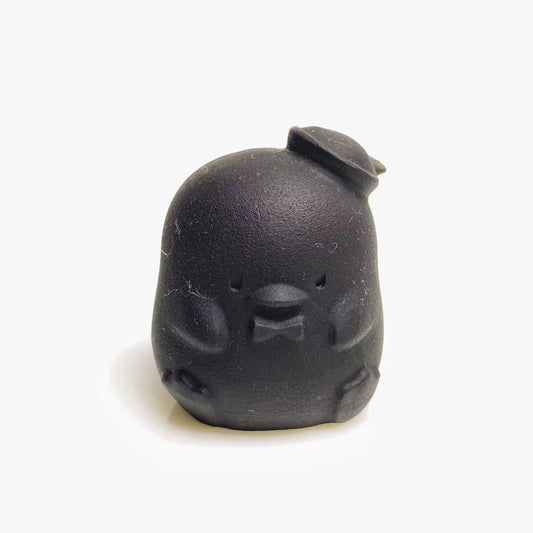 Black obsidian chick carving