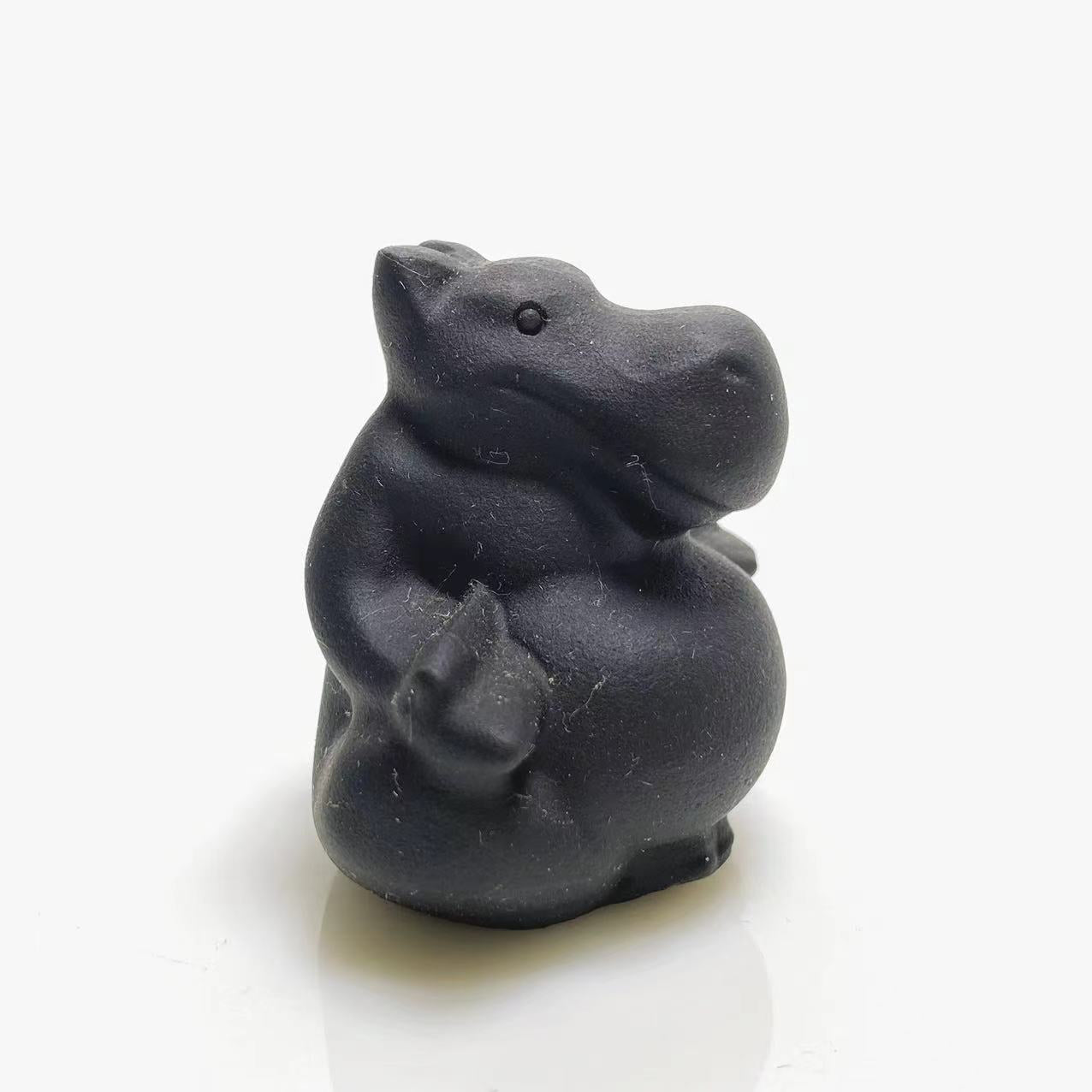 Black obsidian yoga hippo carving