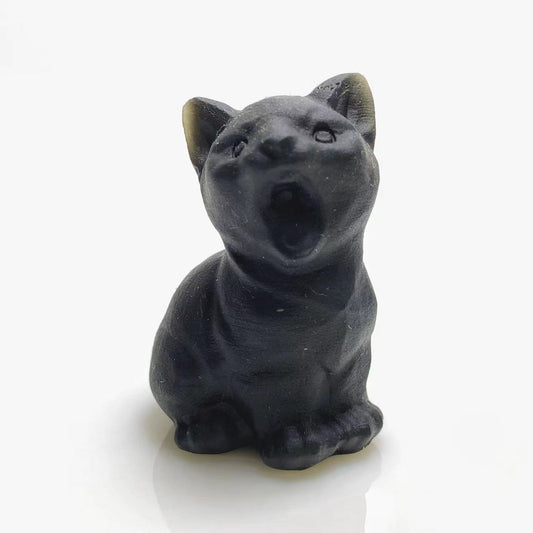 Black obsidian screaming cat carving