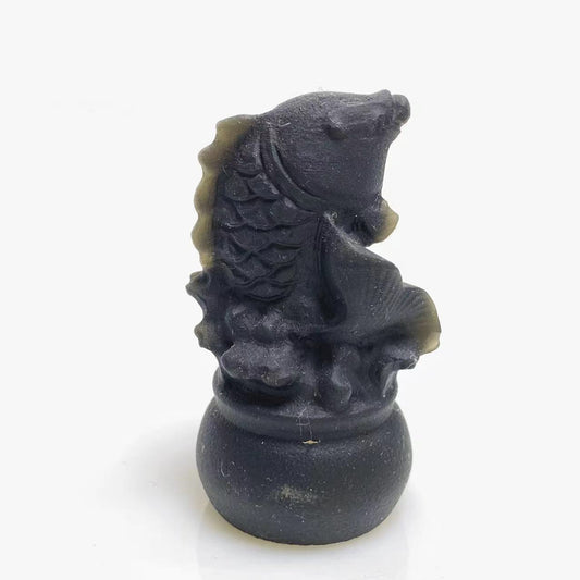 Black obsidian fish carving