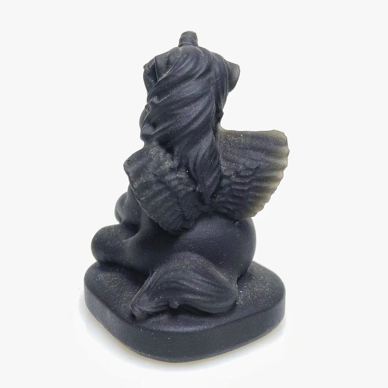 Black obsidian unicorn carving