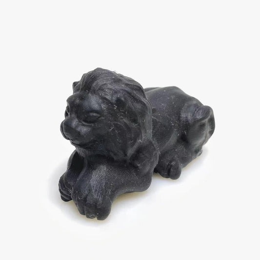 Black obsidian lion carving