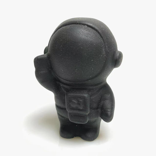 Black obsidian spaceman carving