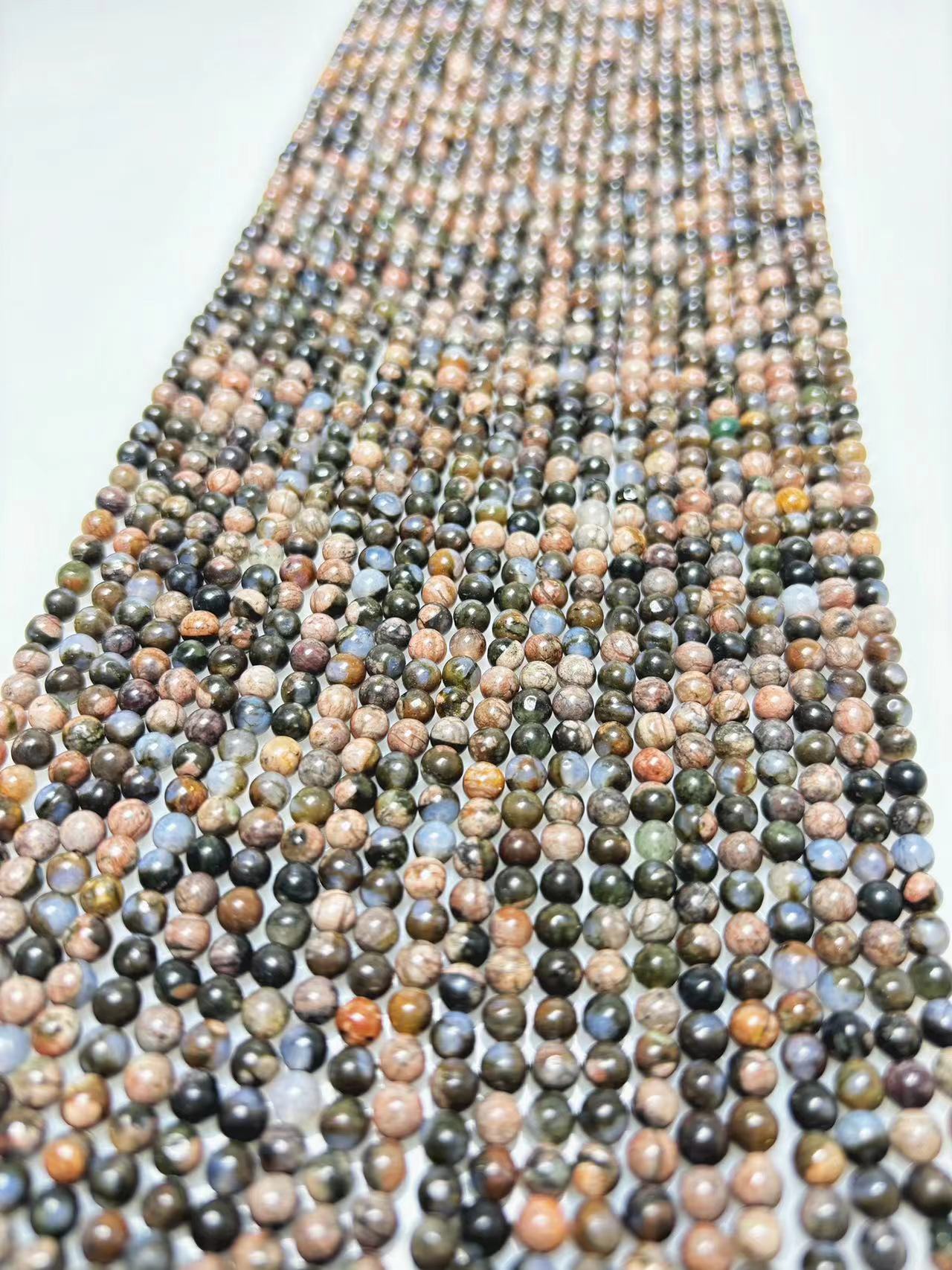 4mm Que sera beads strand